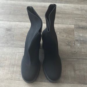 I'm selling a pair of black sock boots, from Zara